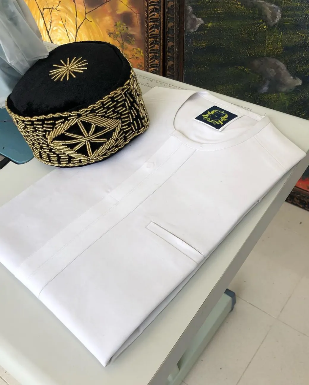 A White with a front-flap traditional African Kaftan and sokoto