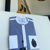 A Windowpane check blue and white mix front flap, hand embroidery patch Pocket African Kaftan