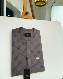 A windowpane tortilla brown with orange and navy blue stripes, a front flap detailing African traditional senator kaftan native.