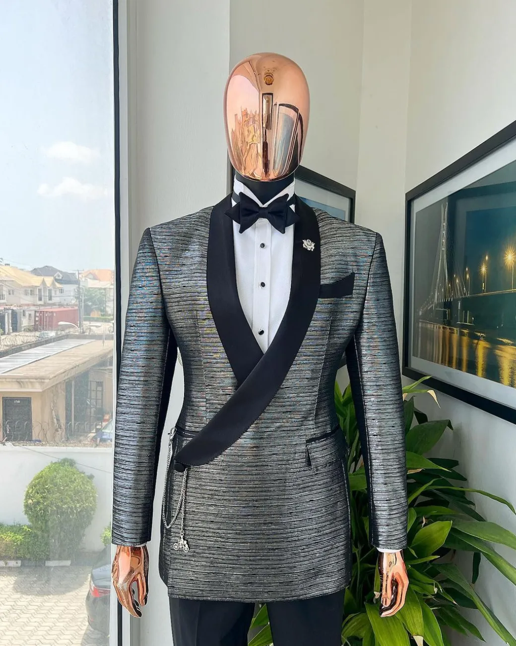 A wire metallic silver and black jacquard, lower cut, wrap shawl lapel tuxedo suit