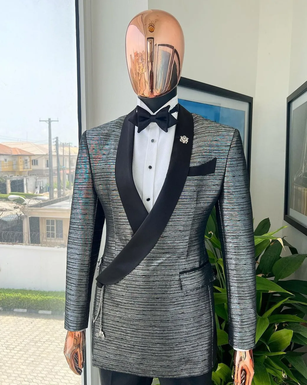 A wire metallic silver and black jacquard, lower cut, wrap shawl lapel tuxedo suit
