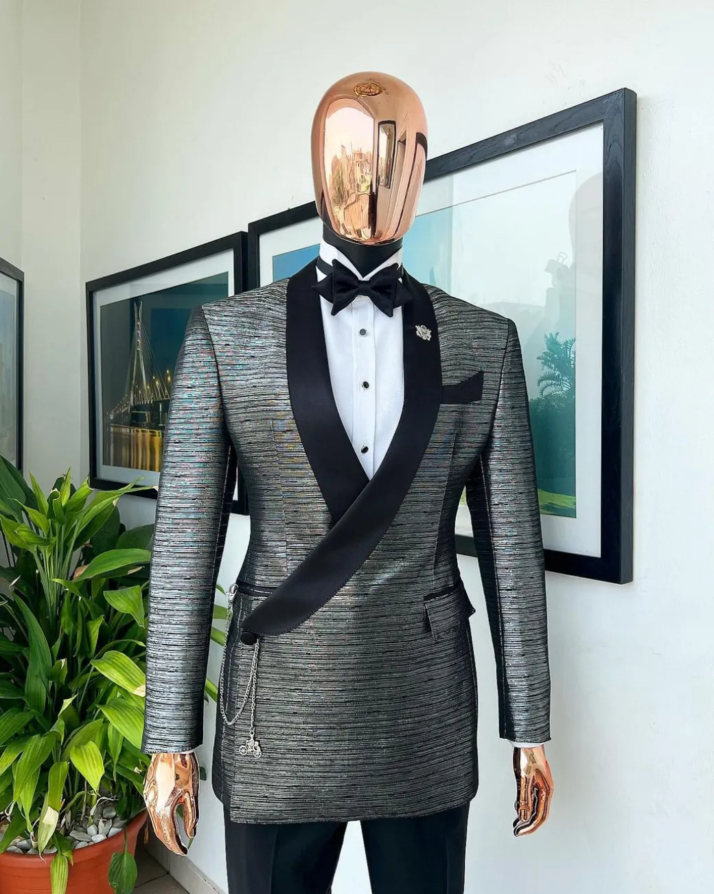 A wire metallic silver and black jacquard, lower cut, wrap shawl lapel tuxedo suit