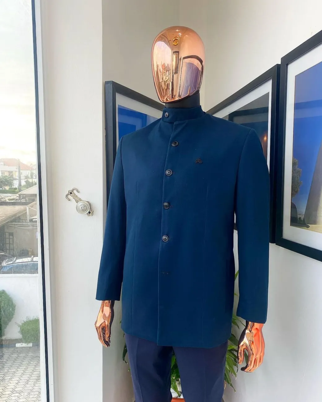 A Yale Blue bishop neck, horizontal pocket jacket