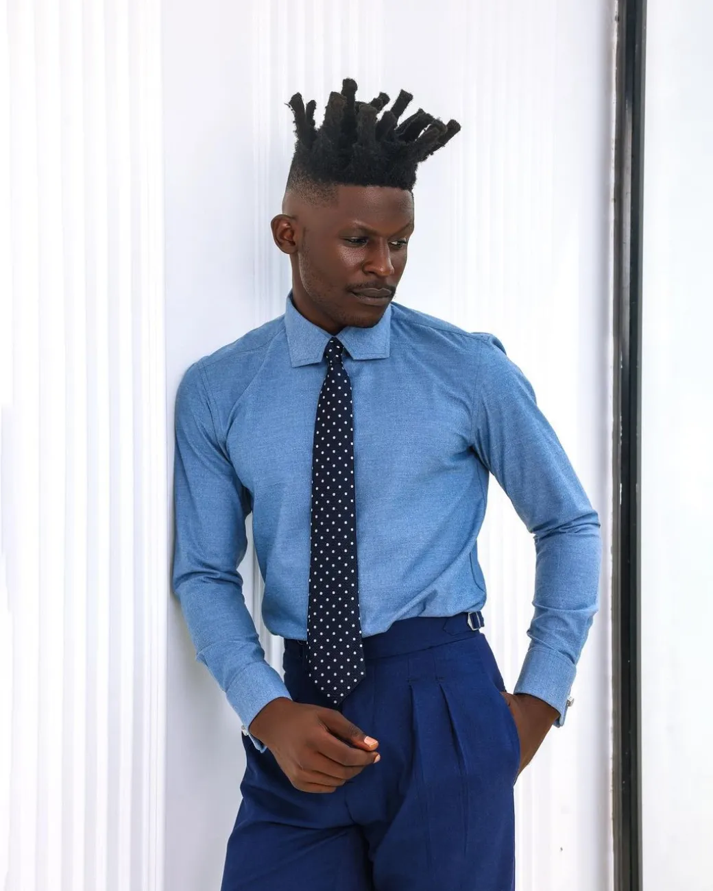 A Zero Pressure, Navy Blue shirt.