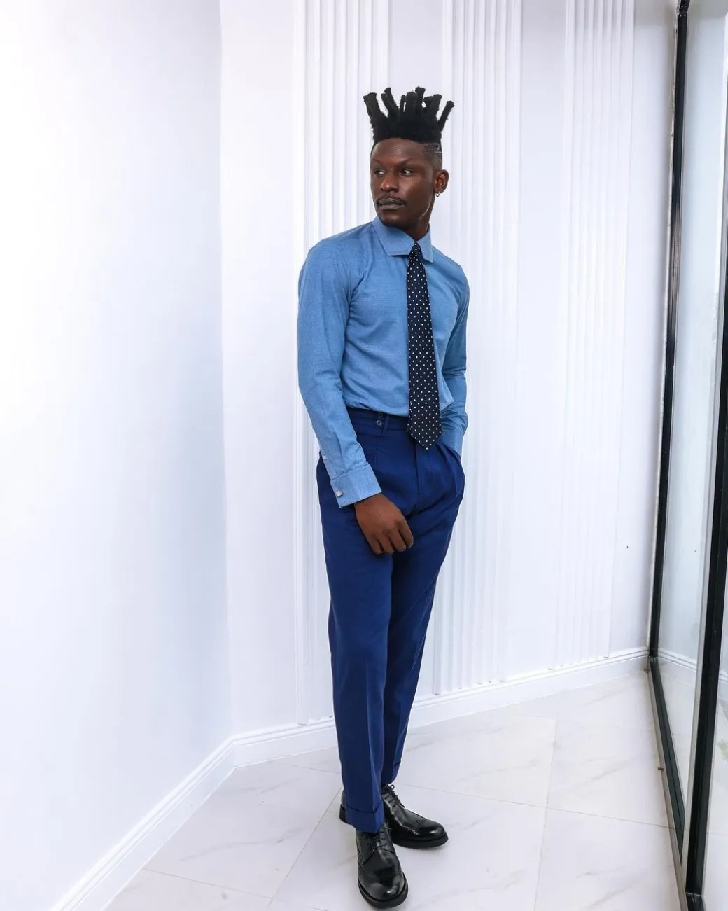 A Zero Pressure, Navy Blue shirt.