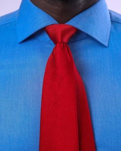 A Zero Pressure, Navy Blue shirt.