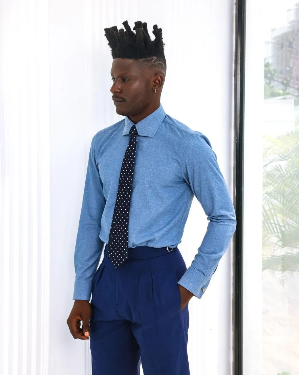 A Zero Pressure, Navy Blue shirt.