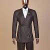 A #Herd” brown leather, knitted & outer layered peak lapel wrap suit