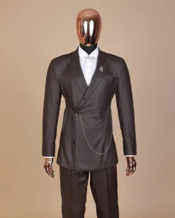 A #Herd” brown leather, knitted & outer layered peak lapel wrap suit