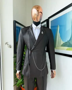 A #Herd” brown leather, knitted & outer layered peak lapel wrap suit
