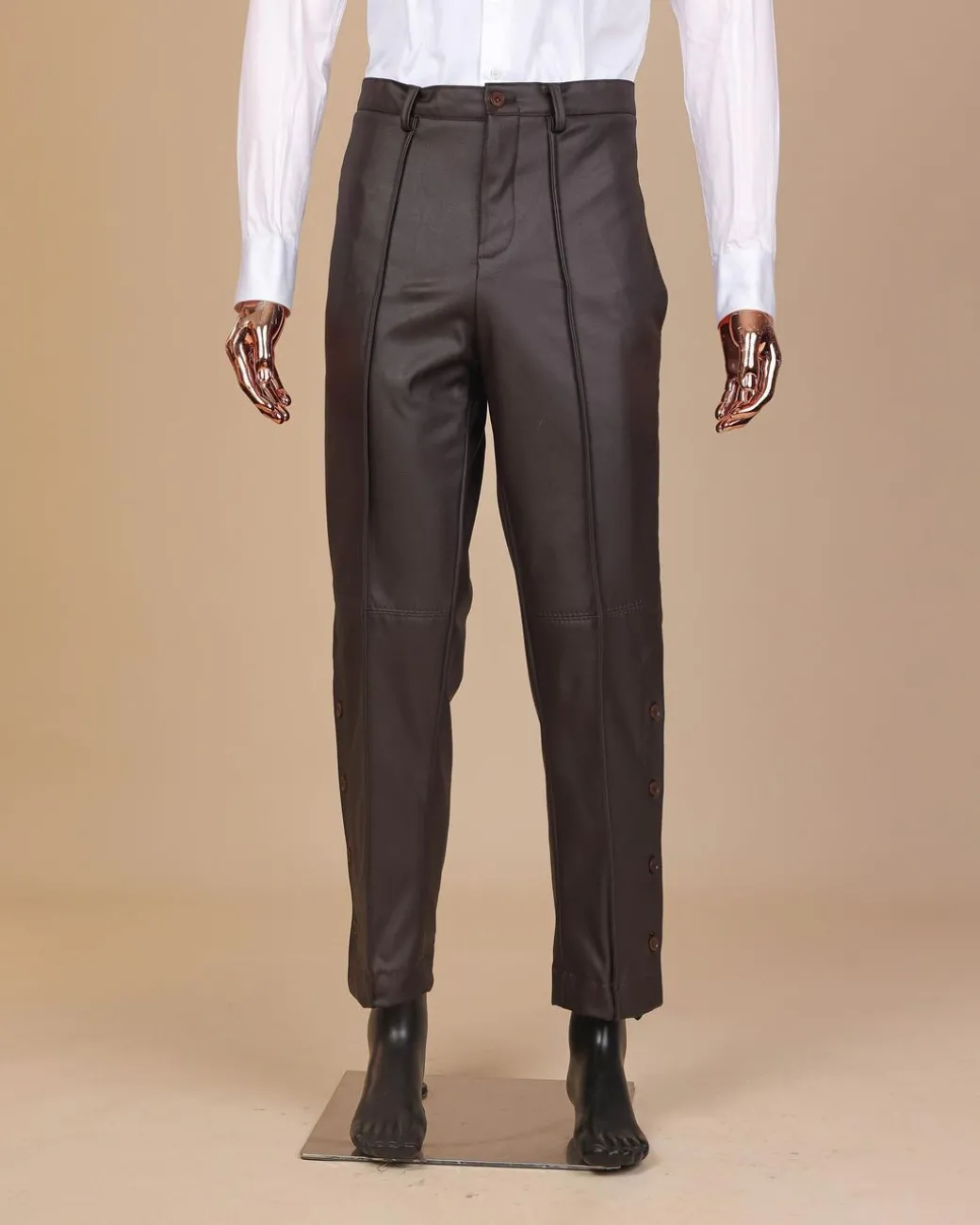 A #Herd” brown leather, knitted & outer layered peak lapel wrap suit