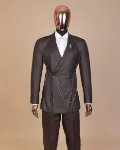 A #Herd” brown leather, knitted & outer layered peak lapel wrap suit