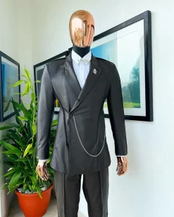 A #Herd” brown leather, knitted & outer layered peak lapel wrap suit