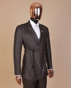 A #Herd” brown leather, knitted & outer layered peak lapel wrap suit