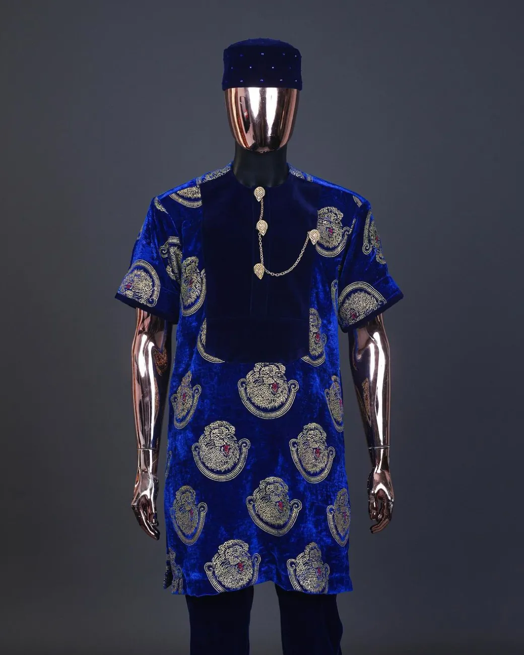 An admiral blue & gold isiagu, mixed with matching soaked velvet, short sleeve kaftan native, Swarovski stone hat & velvet pant Trosuer