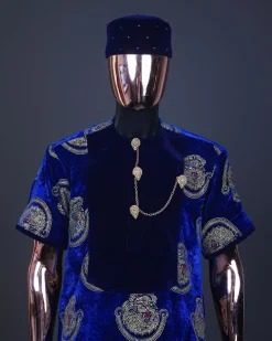 An admiral blue & gold isiagu, mixed with matching soaked velvet, short sleeve kaftan native, Swarovski stone hat & velvet pant Trosuer