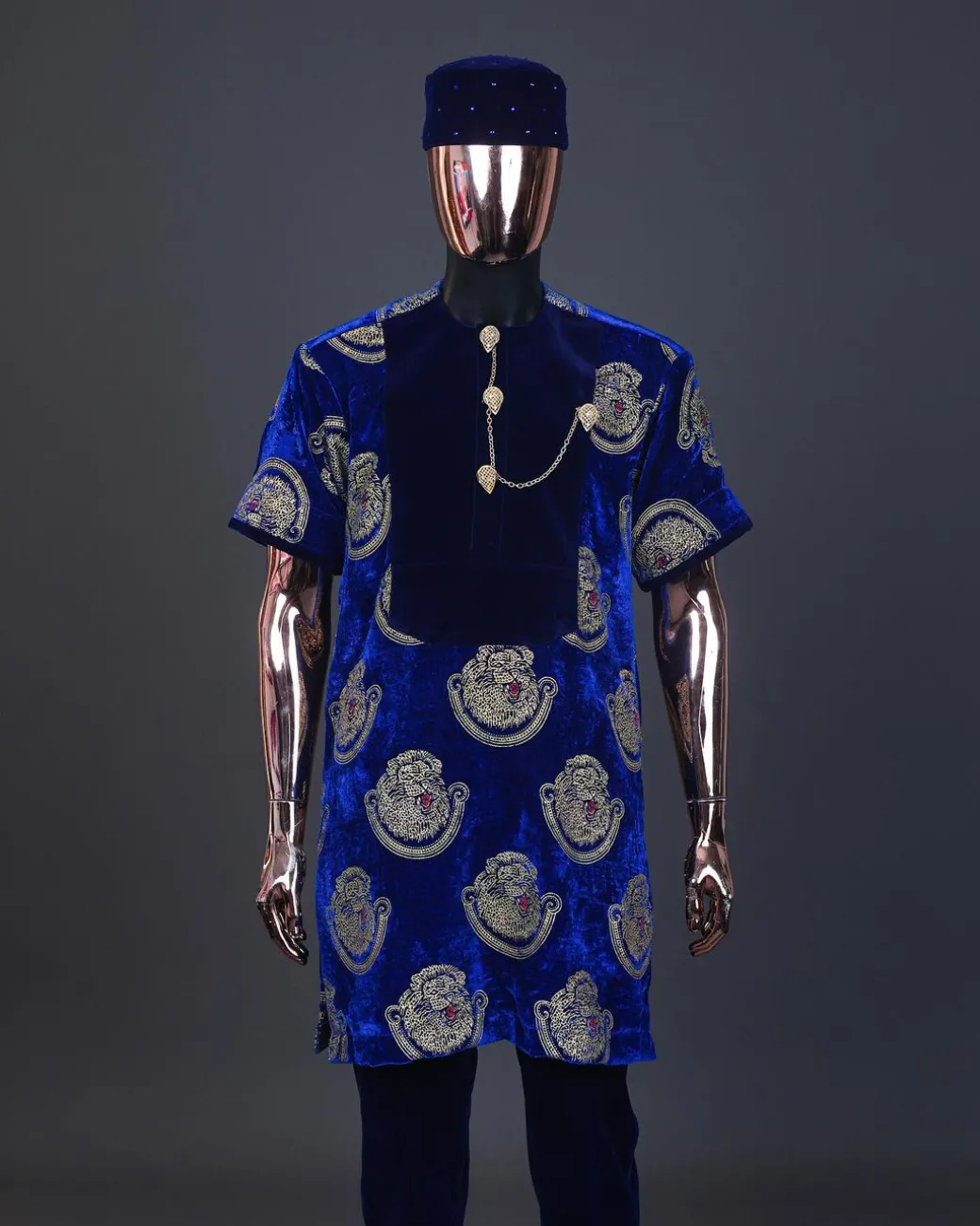 An admiral blue & gold isiagu, mixed with matching soaked velvet, short sleeve kaftan native, Swarovski stone hat & velvet pant Trosuer