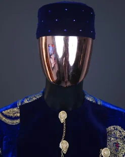 An admiral blue & gold isiagu, mixed with matching soaked velvet, short sleeve kaftan native, Swarovski stone hat & velvet pant Trosuer