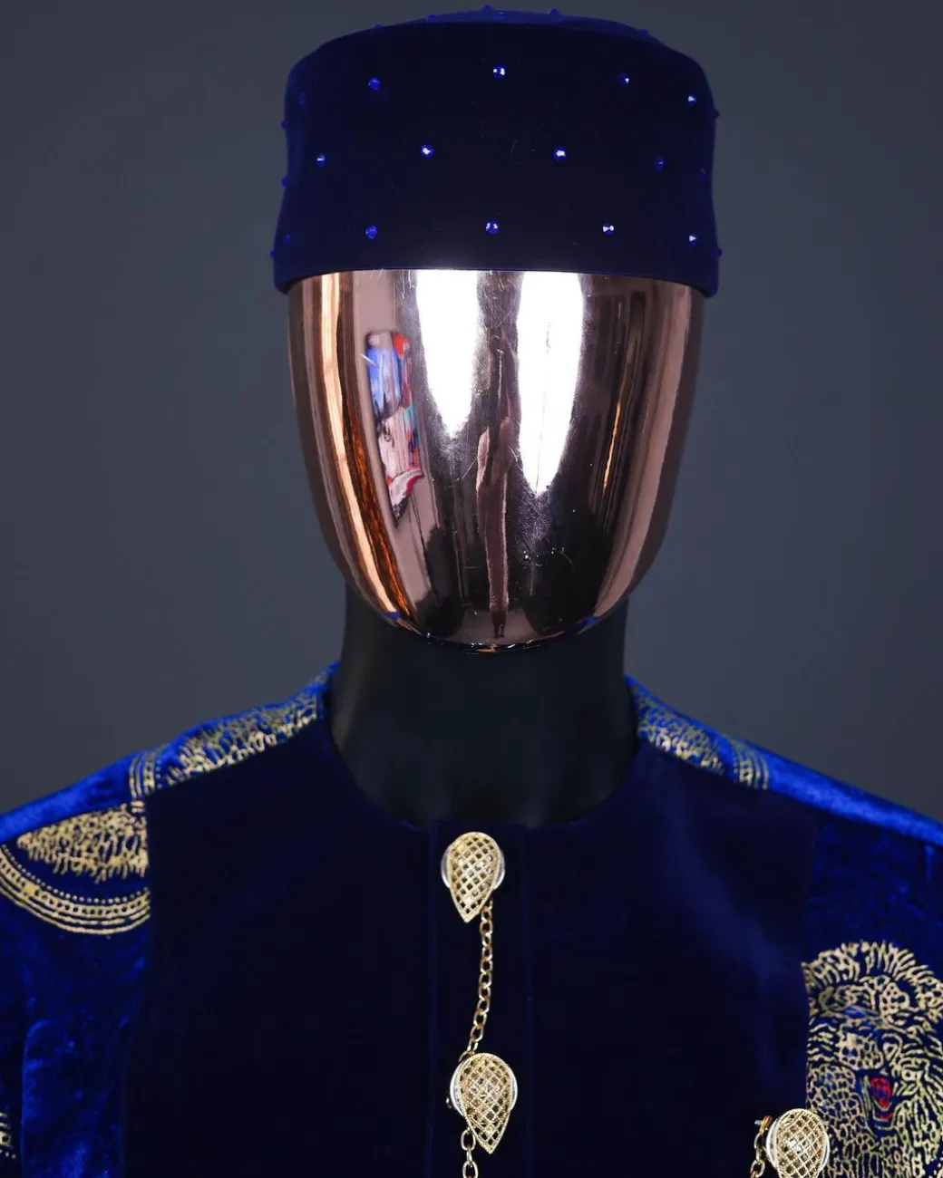 An admiral blue & gold isiagu, mixed with matching soaked velvet, short sleeve kaftan native, Swarovski stone hat & velvet pant Trosuer