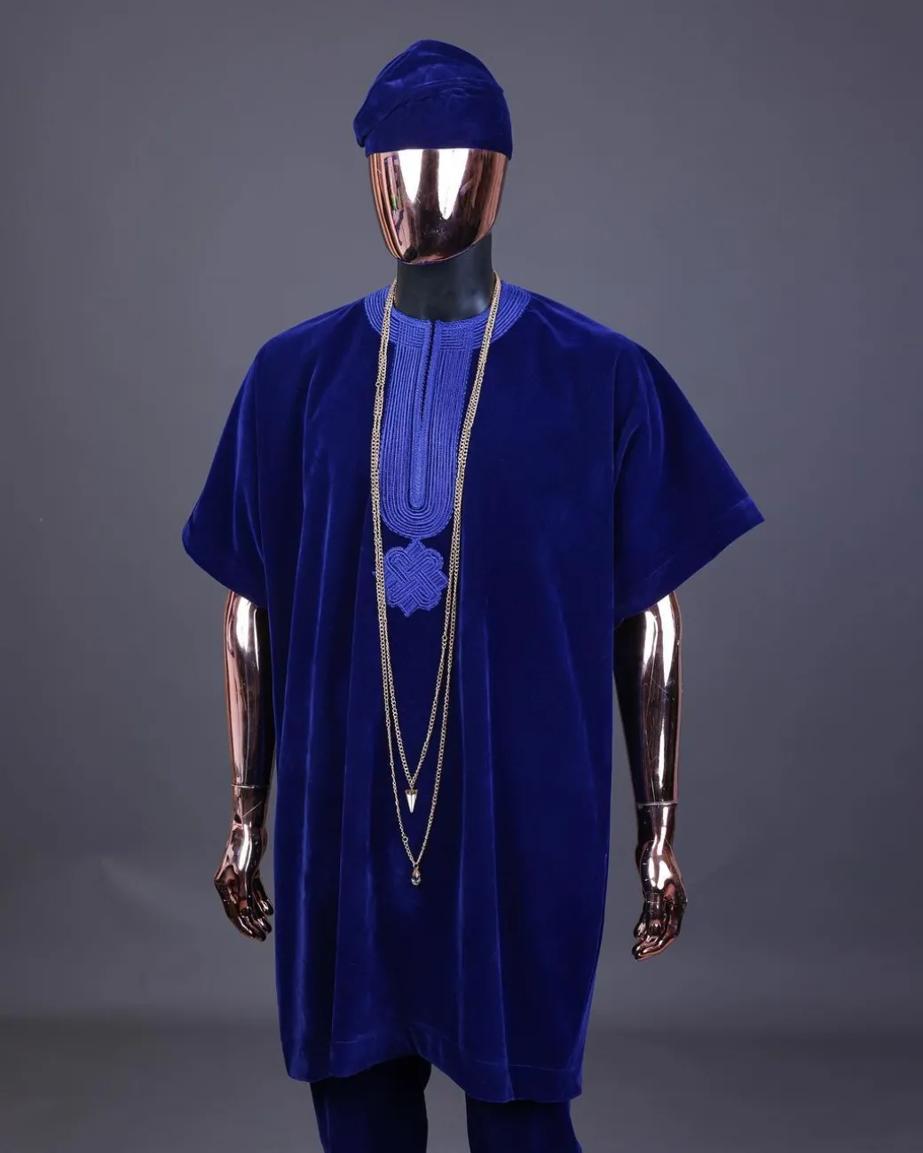 An Admiral blue daftan, sokoto & Fila Yoruba African native.