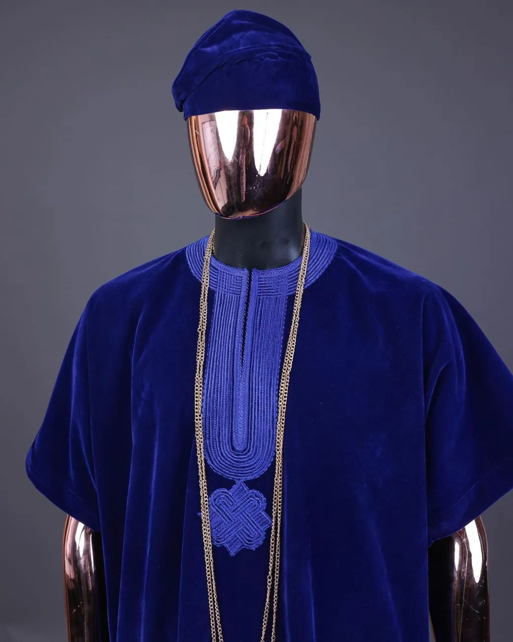 An Admiral blue daftan, sokoto & Fila Yoruba African native.