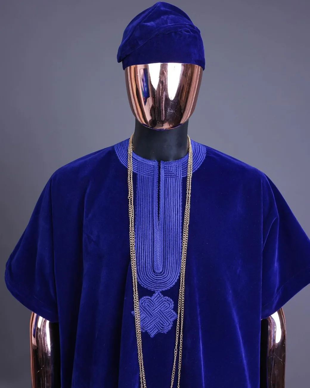 An Admiral blue daftan, sokoto & Fila Yoruba African native.