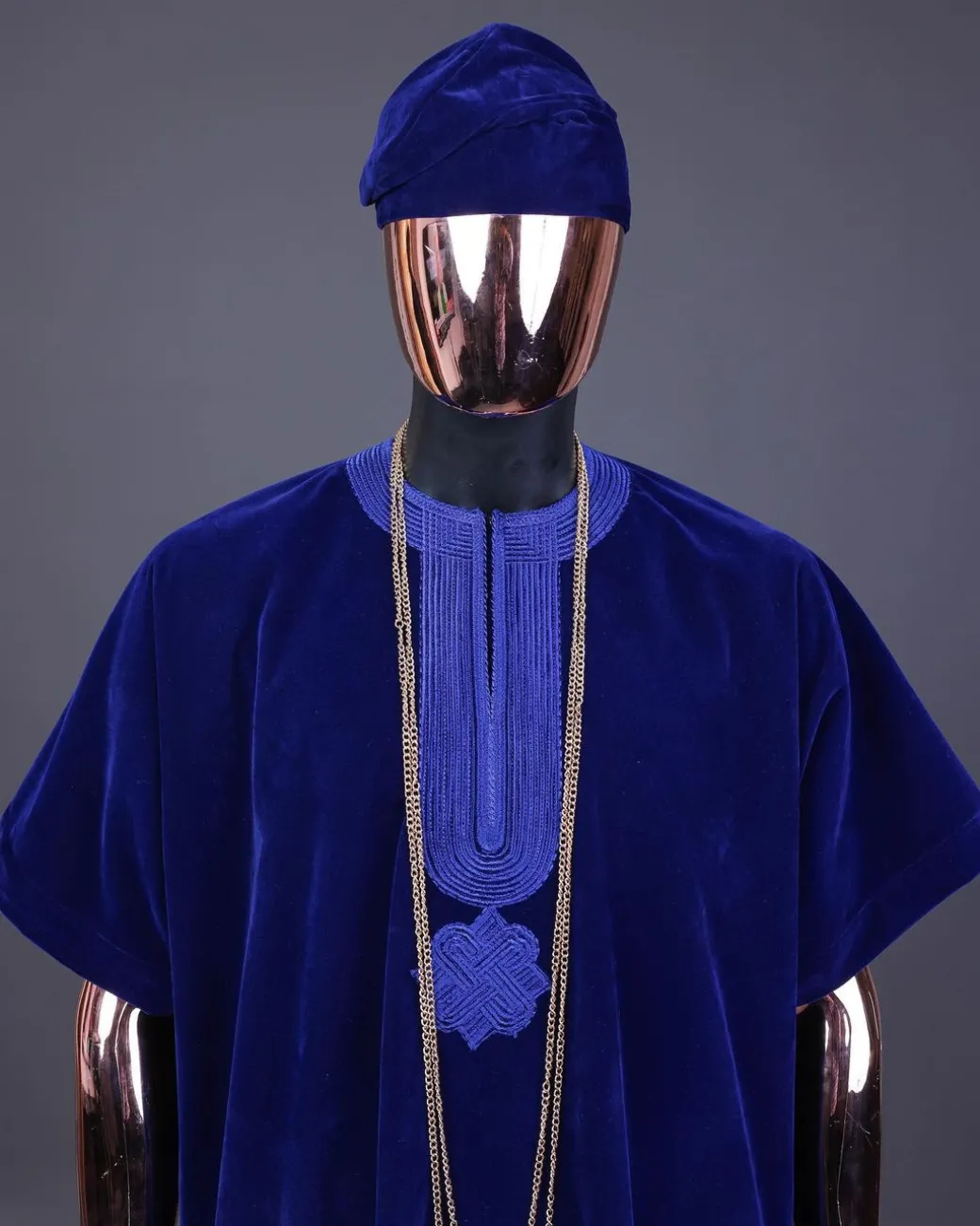 An Admiral blue daftan, sokoto & Fila Yoruba African native.