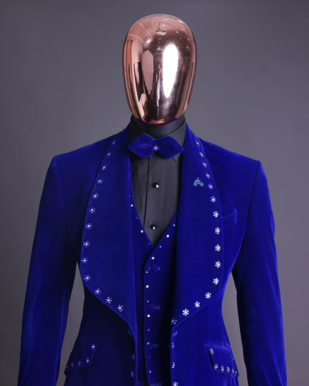 An Admiral Blue velvet shawl lapel tuxedo suit, laced with navy blue and silver ss20 Swarovski stones