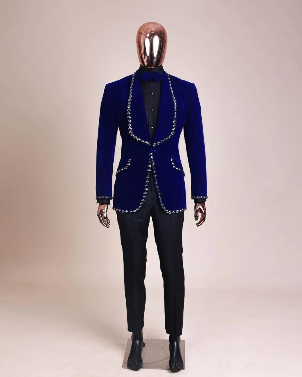 An Admiral Blue velvet shawl lapel tuxedo suit, laced with jet hematite Swarovski stones