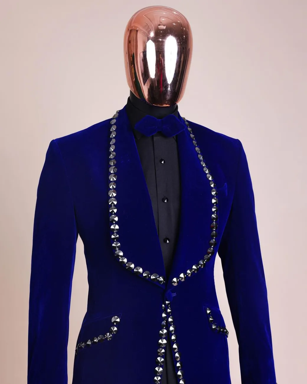 An Admiral Blue velvet shawl lapel tuxedo suit, laced with jet hematite Swarovski stones