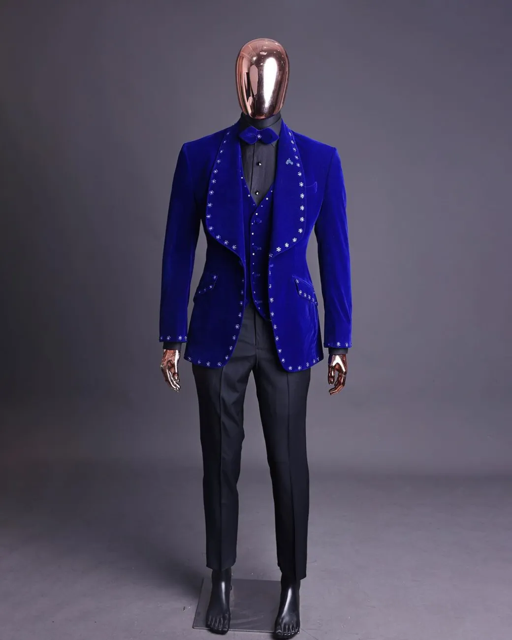 An Admiral Blue velvet shawl lapel tuxedo suit, laced with navy blue and silver ss20 Swarovski stones