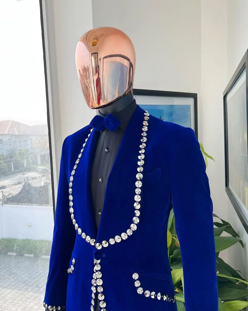 An Admiral Blue velvet shawl lapel tuxedo suit, laced with jet hematite Swarovski stones