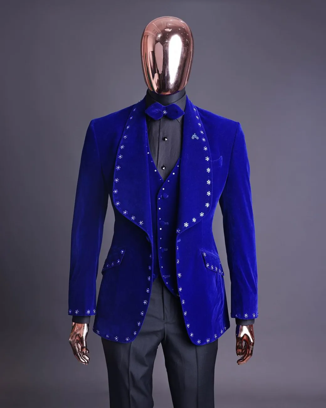 An Admiral Blue velvet shawl lapel tuxedo suit, laced with navy blue and silver ss20 Swarovski stones