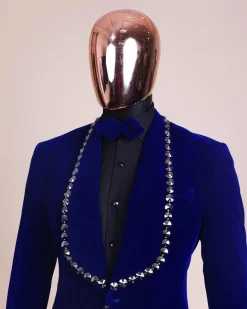 An Admiral Blue velvet shawl lapel tuxedo suit, laced with jet hematite Swarovski stones