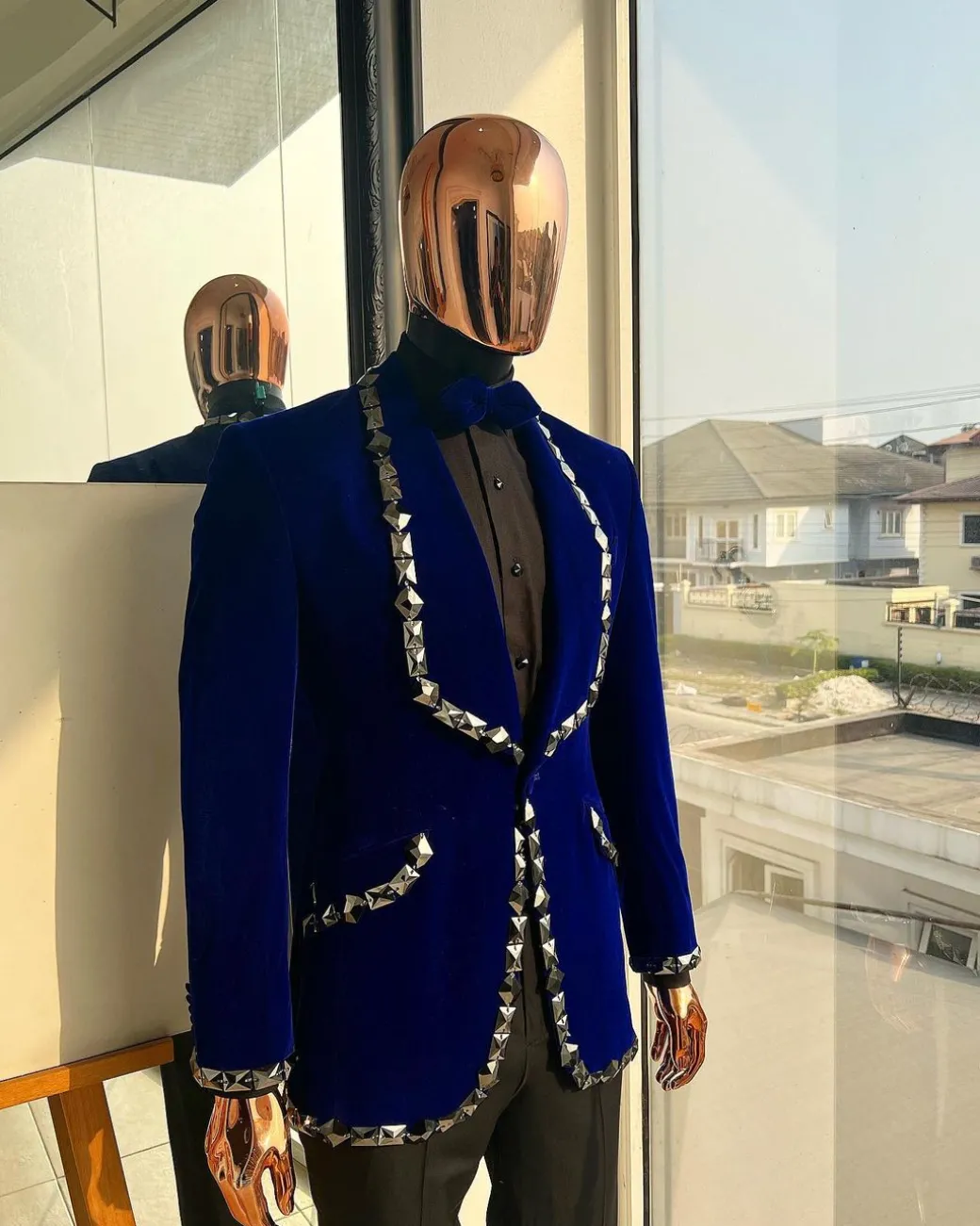 An Admiral Blue velvet shawl lapel tuxedo suit, laced with jet hematite Swarovski stones