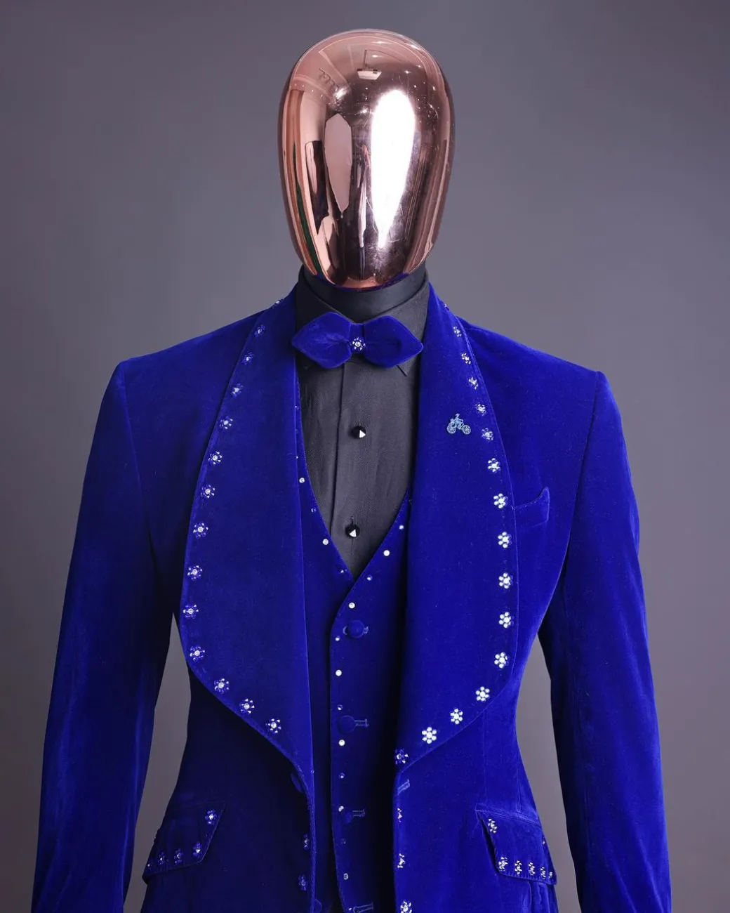 An Admiral Blue velvet shawl lapel tuxedo suit, laced with navy blue and silver ss20 Swarovski stones