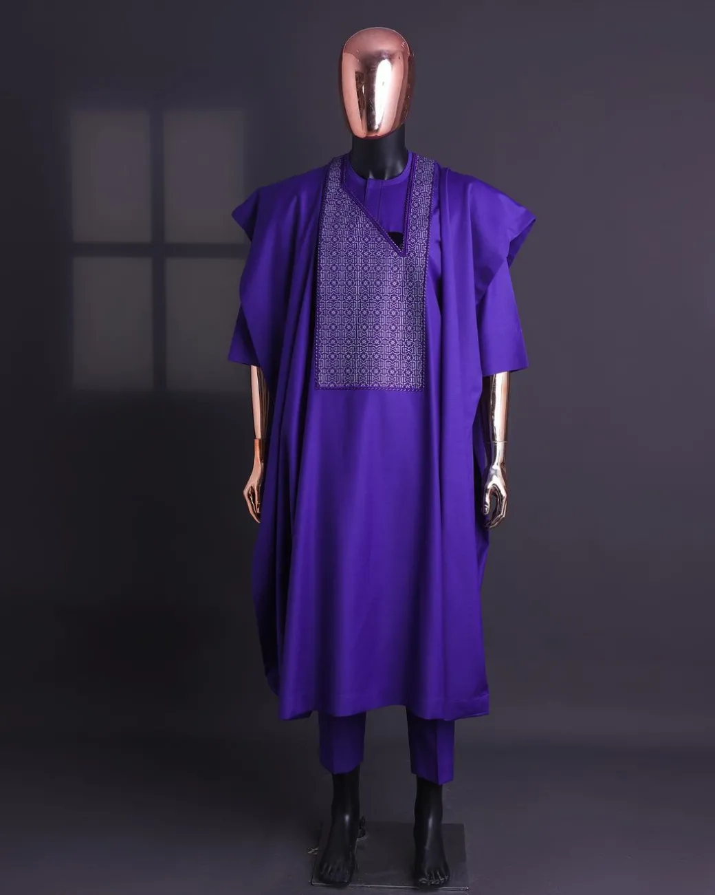 An Aesthetic purple, “Connected circled” embroidery details Agbada.