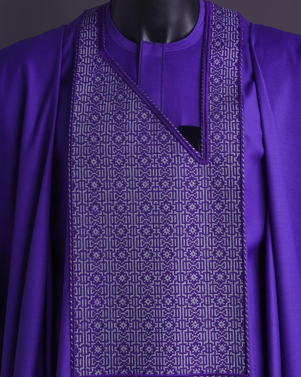 An Aesthetic purple, “Connected circled” embroidery details Agbada.
