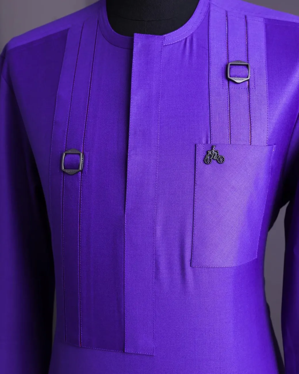 An Aesthetic purple, lengthened rectangle double side flap, 3/4 sleeve with paisley details traditional African senator kaftan native.