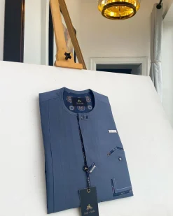 An air-force blue strap and roof pocket, single button front flap Kaftan