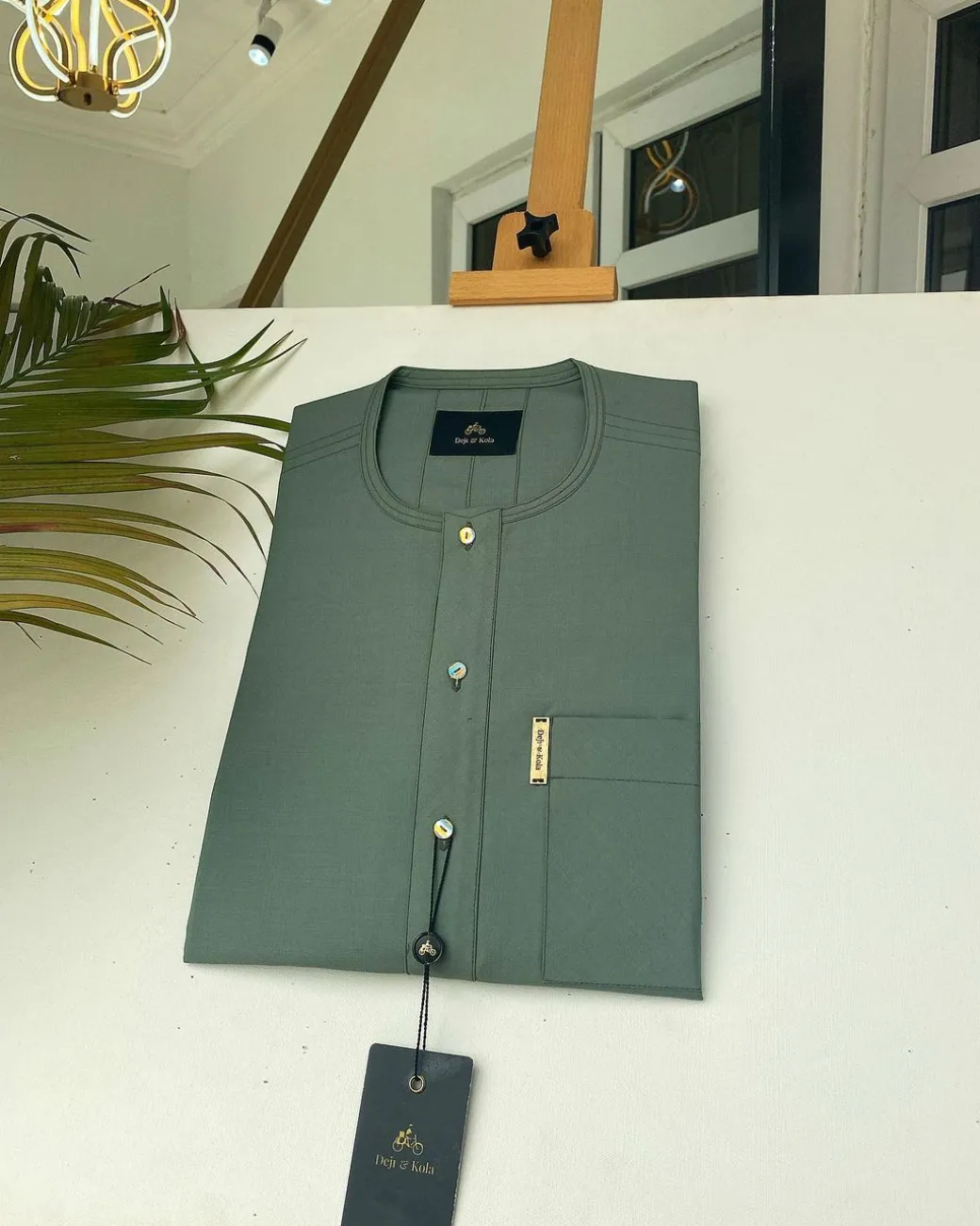 An Aqua green front flap African kaftan with Swarovski button and Sokoto