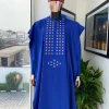 An Azure blue, connected square embroidery design with gold treading & matching Swarovski stone details agbada