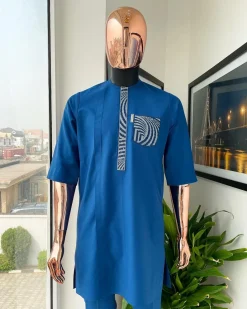 An azure blue, curly 3D embroidery flap and pocket detailing African traditional senator kaftan native