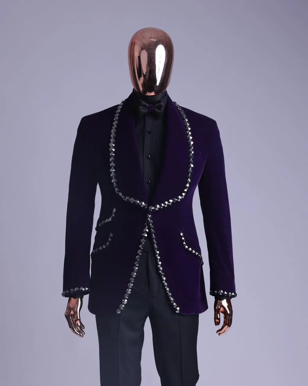 An egg plant purple velvet shawl lapel tuxedo suit, laced with jet hematite Swarovski stones