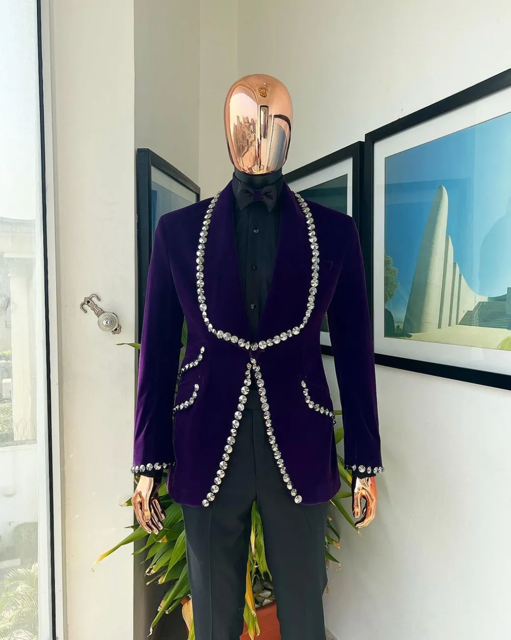 An egg plant purple velvet shawl lapel tuxedo suit, laced with jet hematite Swarovski stones