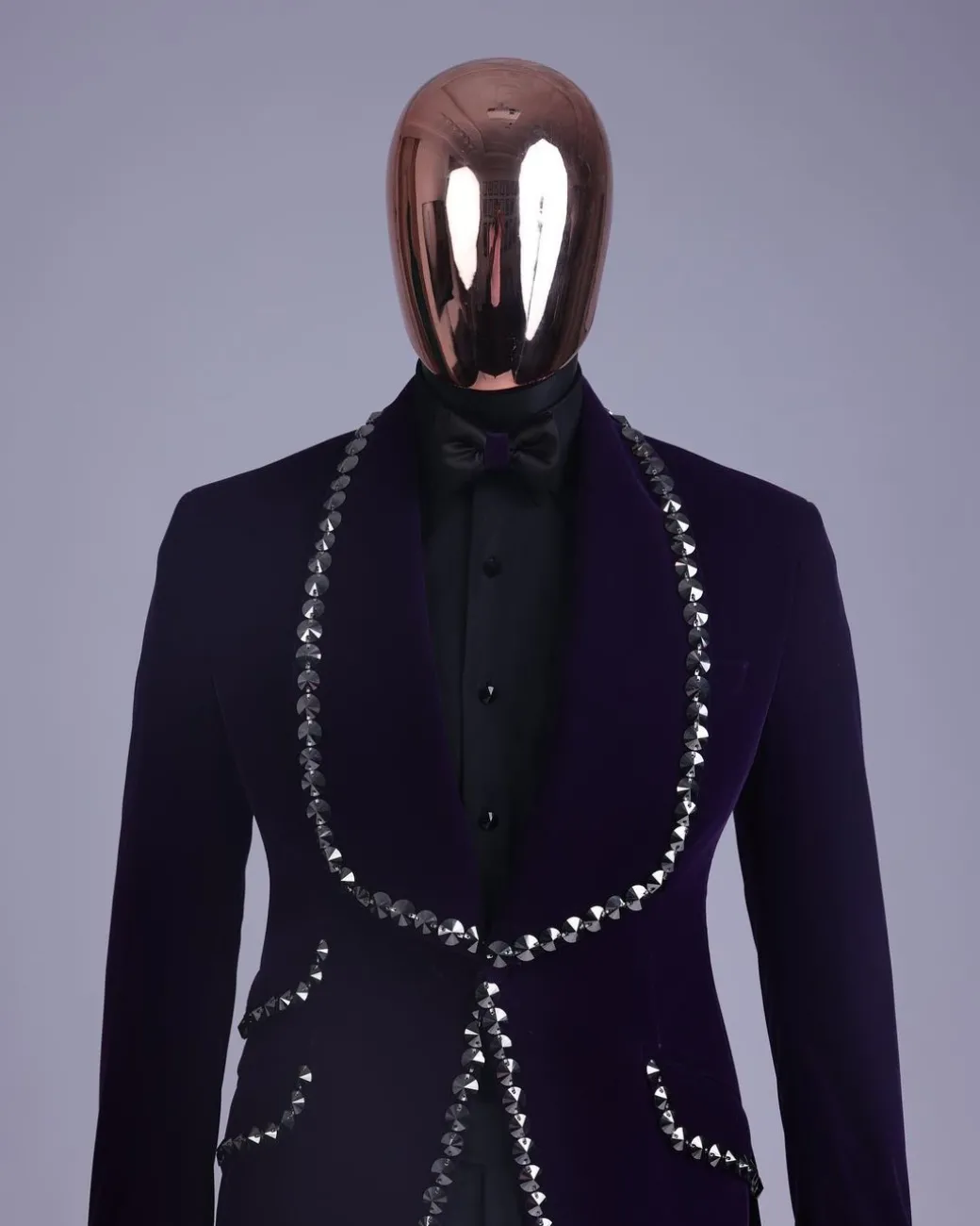 An egg plant purple velvet shawl lapel tuxedo suit, laced with jet hematite Swarovski stones