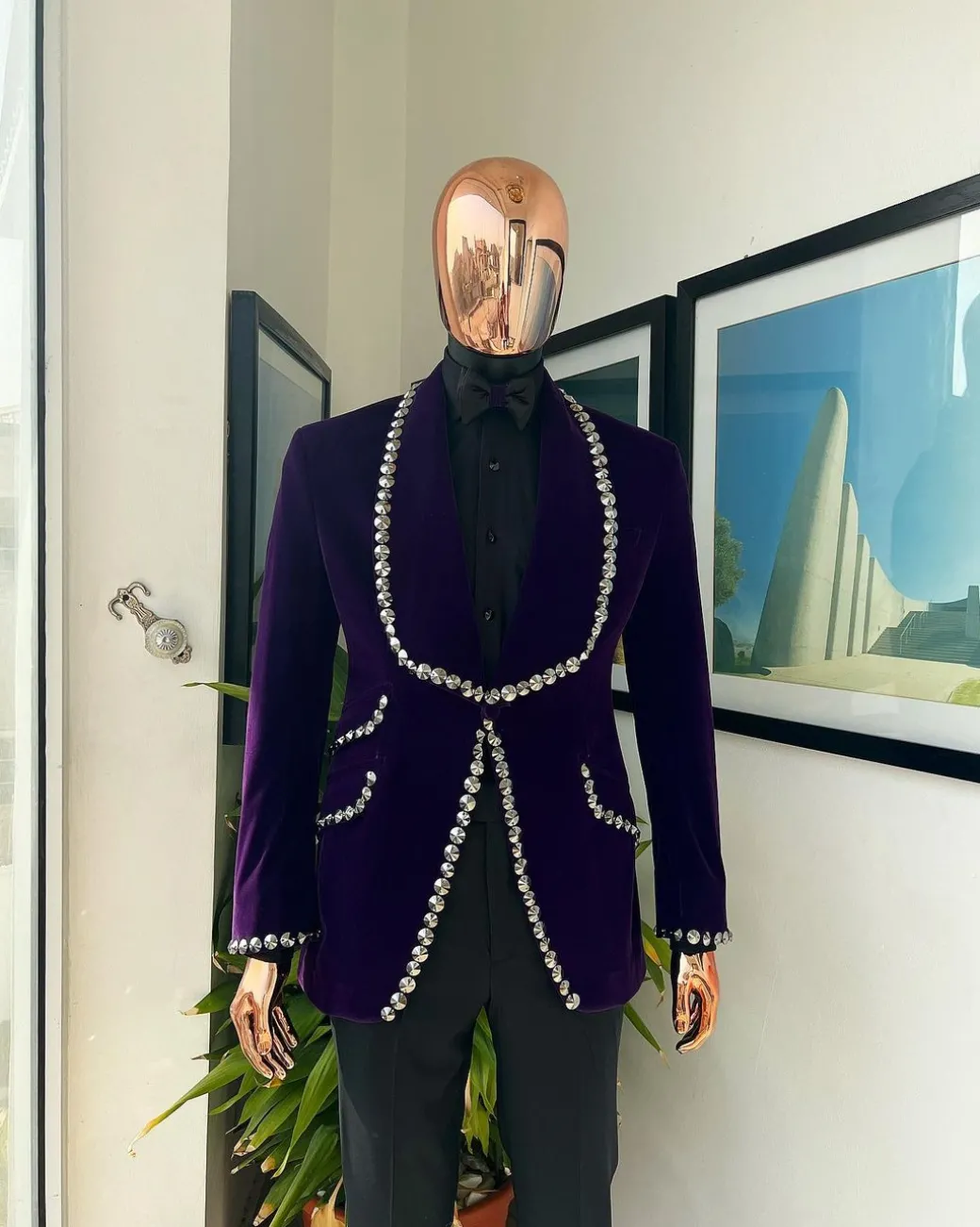 An egg plant purple velvet shawl lapel tuxedo suit, laced with jet hematite Swarovski stones