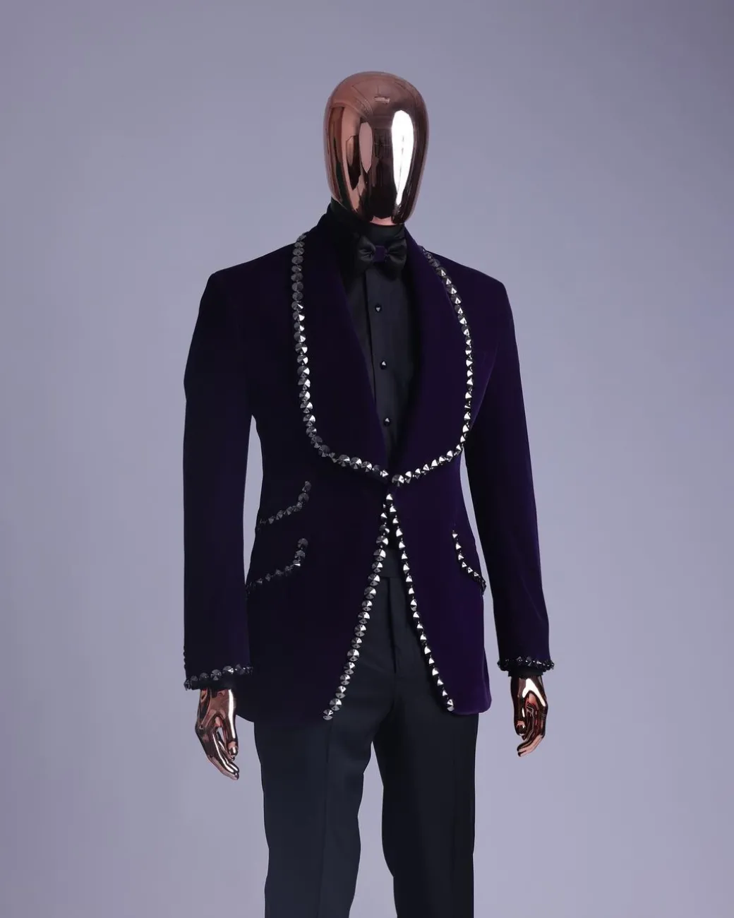 An egg plant purple velvet shawl lapel tuxedo suit, laced with jet hematite Swarovski stones