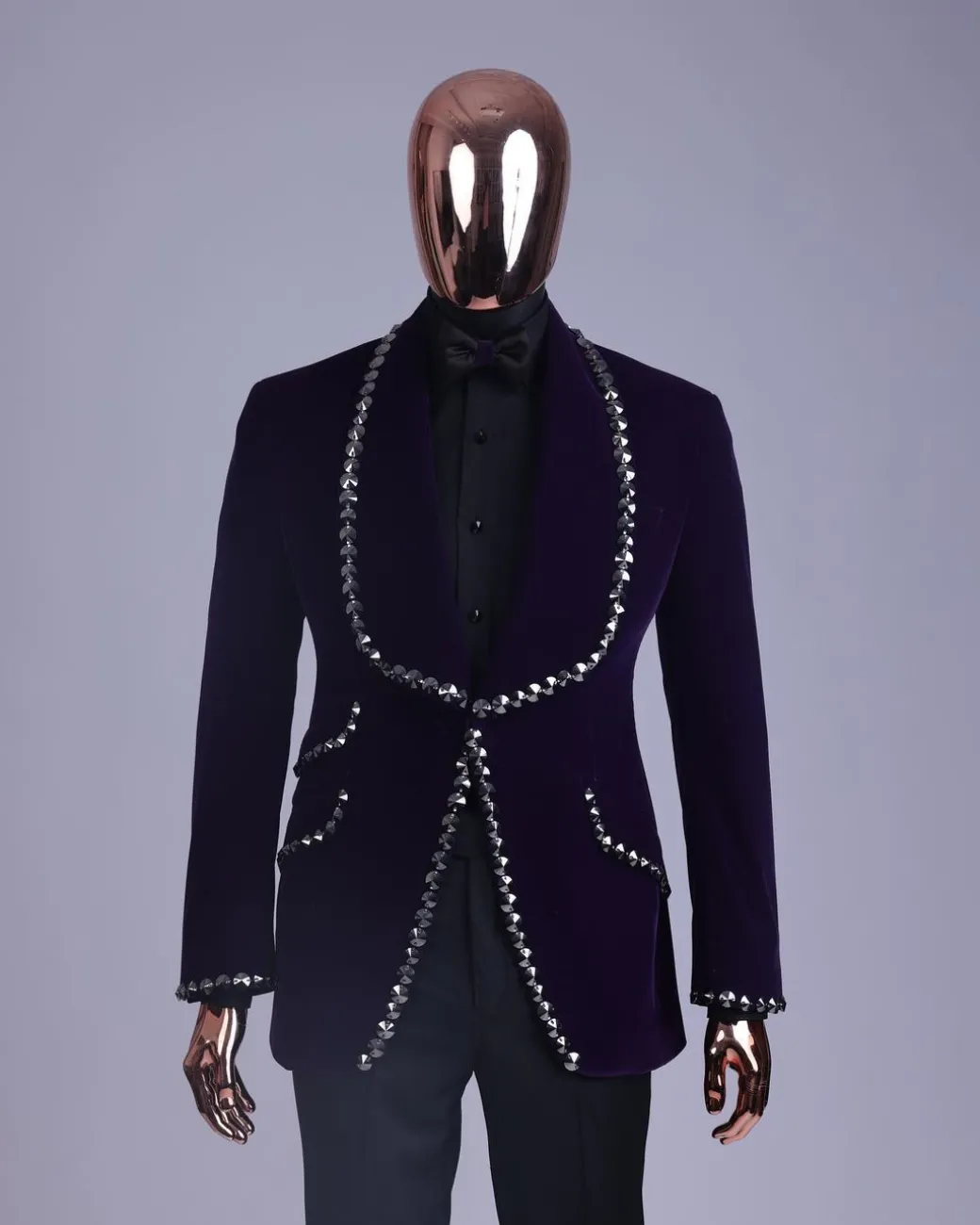An egg plant purple velvet shawl lapel tuxedo suit, laced with jet hematite Swarovski stones