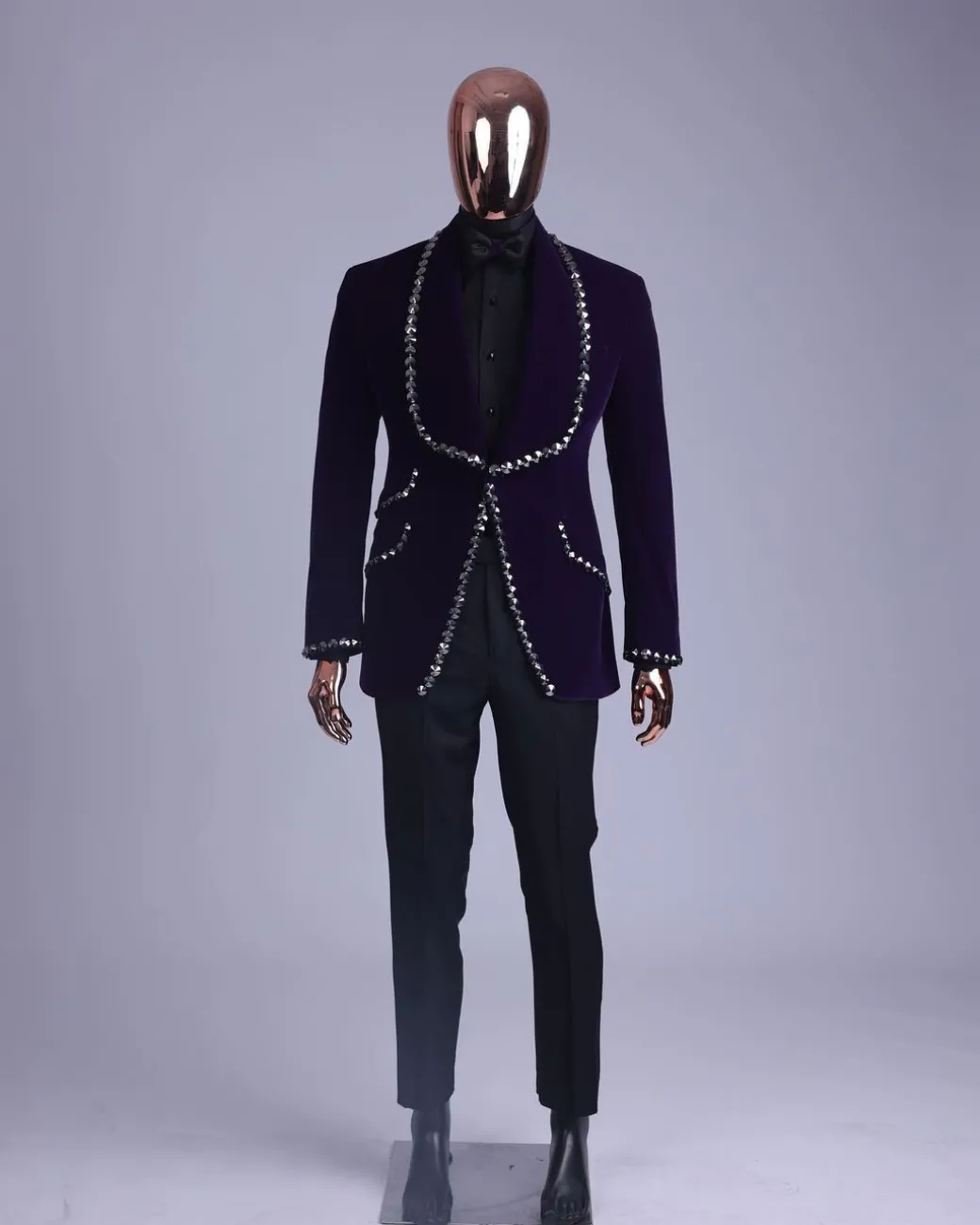 An egg plant purple velvet shawl lapel tuxedo suit, laced with jet hematite Swarovski stones